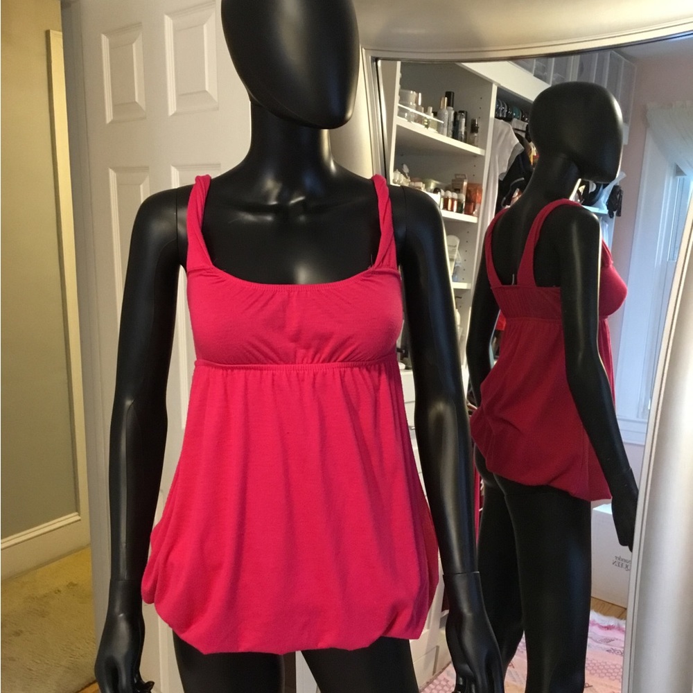Pink shirt with rolled sleeves and bottom